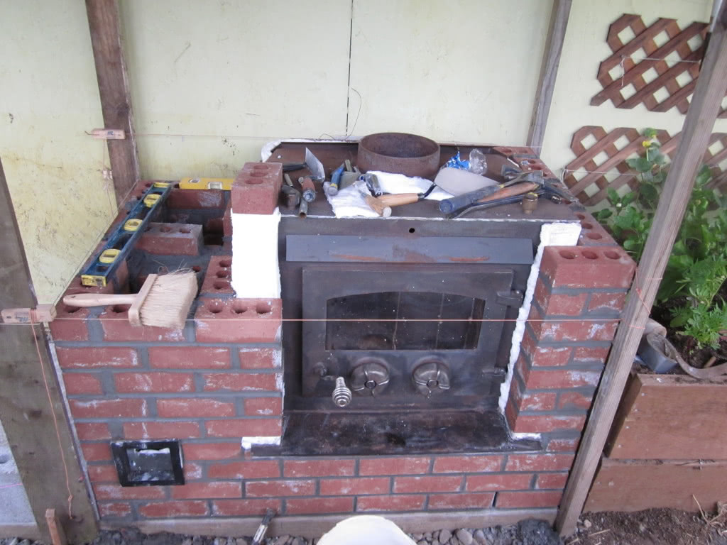 Affordable way to add mass to existing woodstove? (wood burning